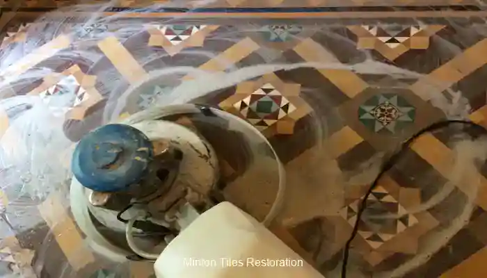 Restored Victorian Minton tiled hallway with cleaner colour and defined pattern